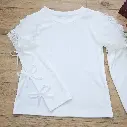 Blouse blanche fille avec manches en tulle et nœuds